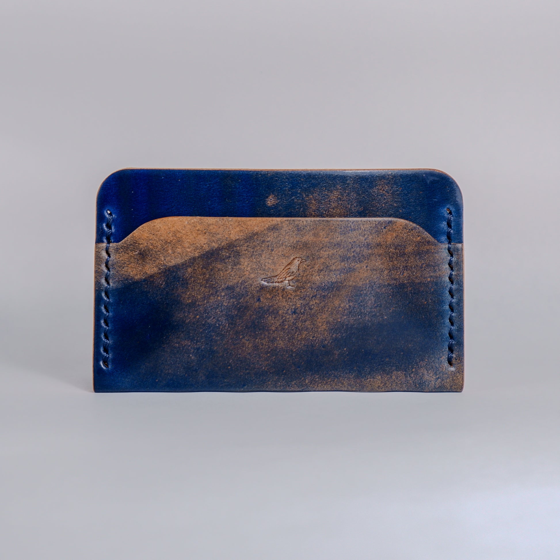 Closed Ocean (Blue) The Erikson-Marbled Shell Cordovan Wallet displayed on a white background.