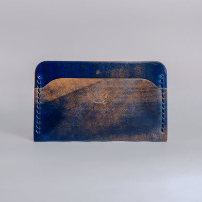 Closed Ocean (Blue) The Erikson-Marbled Shell Cordovan Wallet displayed on a white background.