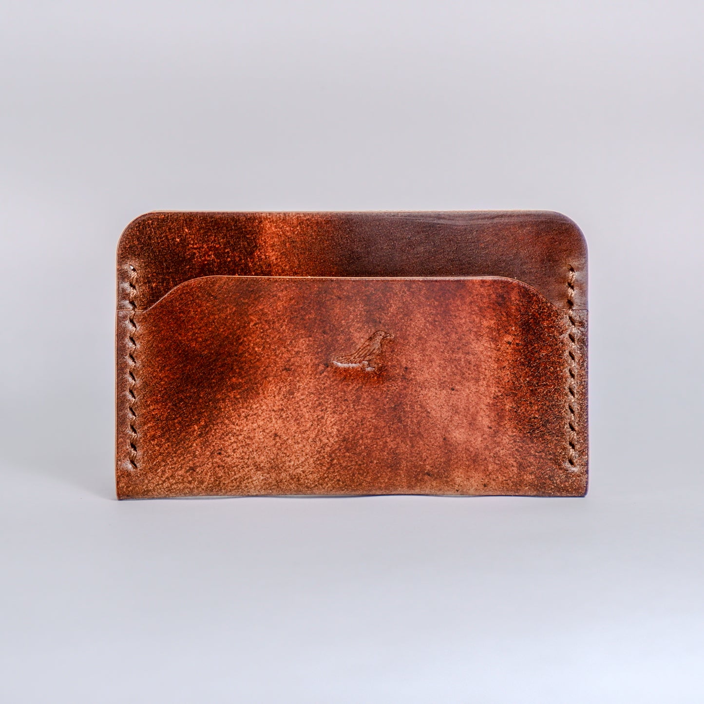 Closed Walnut (Dark Brown) The Erikson-Marbled Shell Cordovan Wallet displayed on a white background