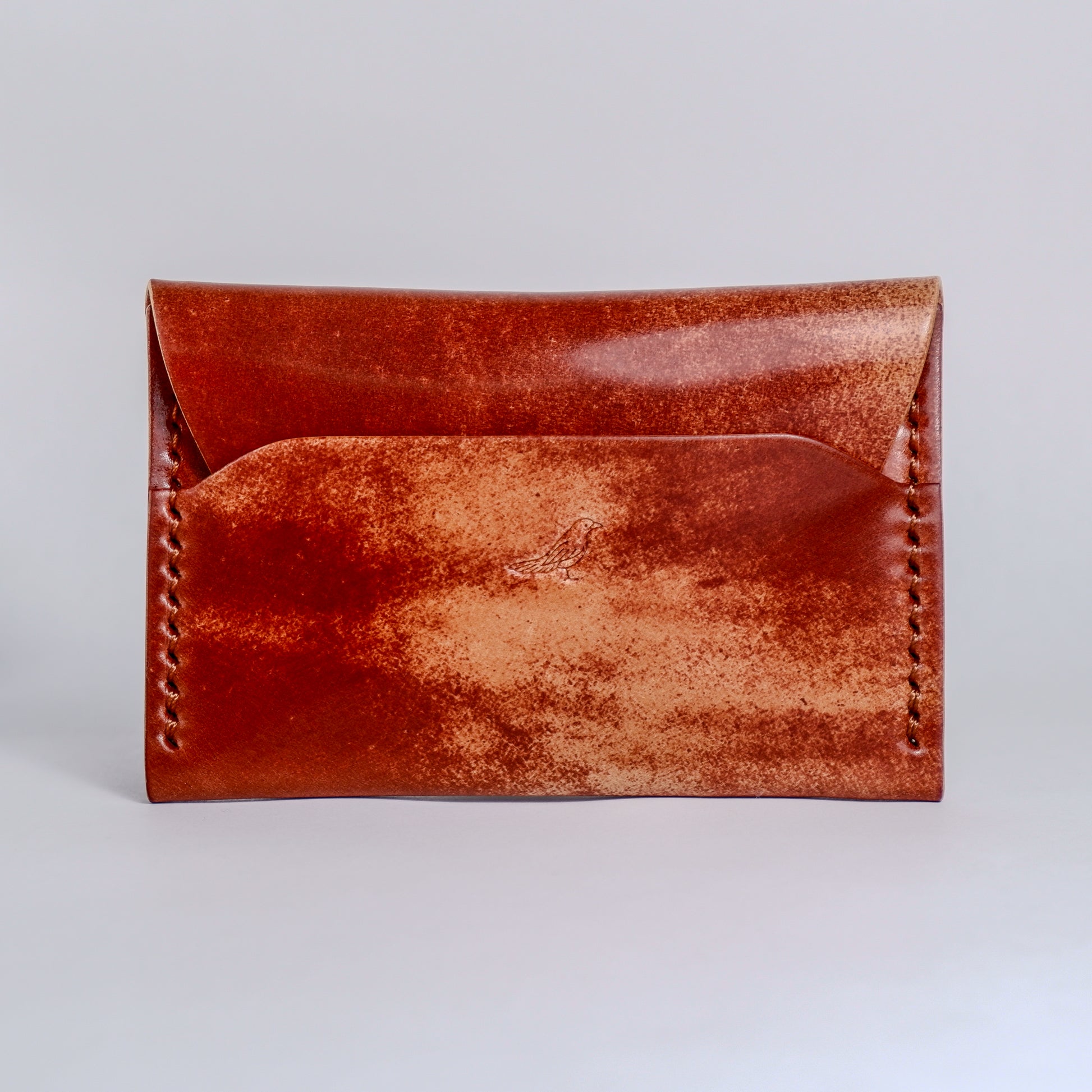 Closed Sienna (Light Brown) The Warden-Marbled Shell Cordovan Wallet displayed on a white background.