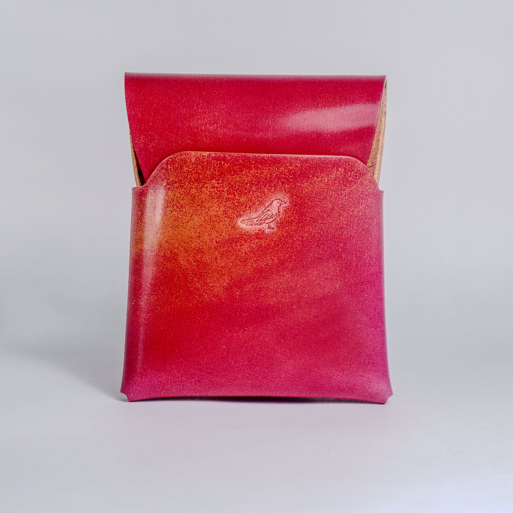 Closed Electric Pink The Cash Emerson-Marbled Shell Cordovan Wallet displayed on a white background viewed from the front