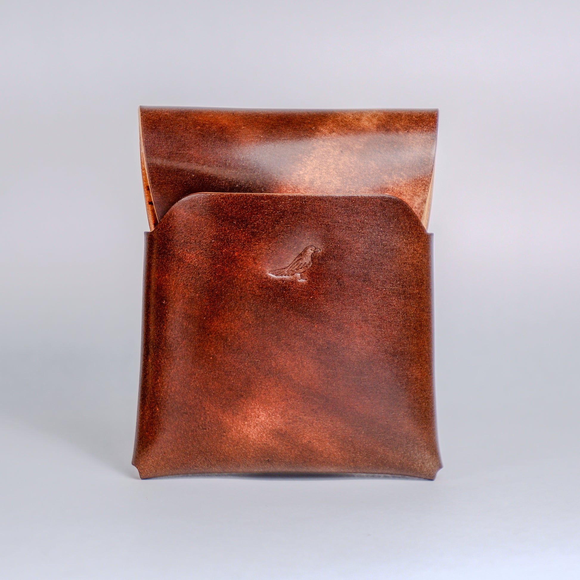 Closed Walnut (Dark Brown) The Cash Emerson-Marbled Shell Cordovan Wallet displayed on a white background.