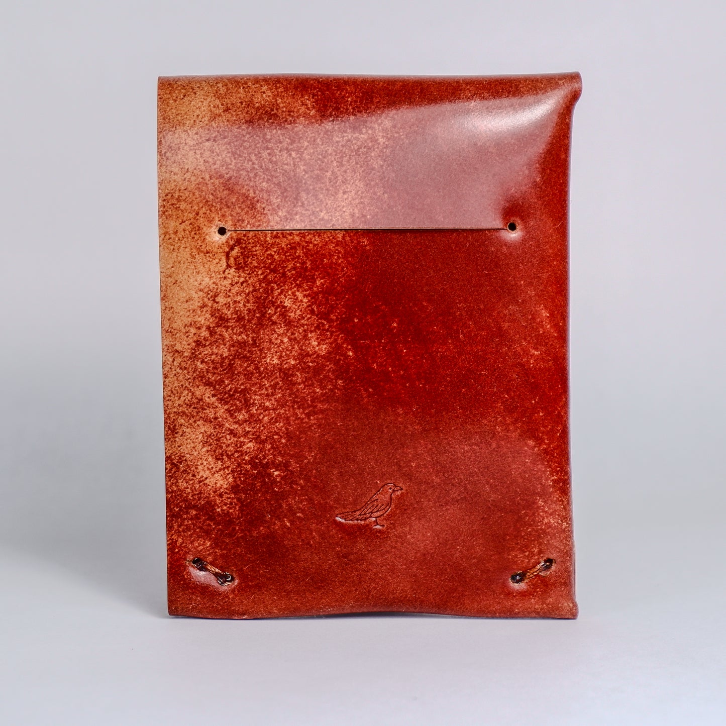 Closed Sienna (Light Brown) Archer-Marbled Shell Cordovan Wallet displayed on a white background viewed from the fback