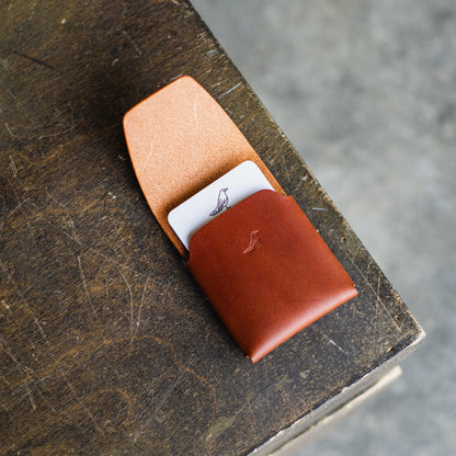 Open brown Pattern Emerson Wallet featuring a Harland card neatly displayed inside