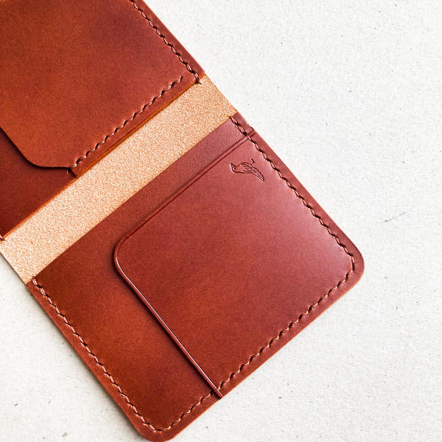 Opened Brown Pattern - Garrison Wallet displayed on a white table