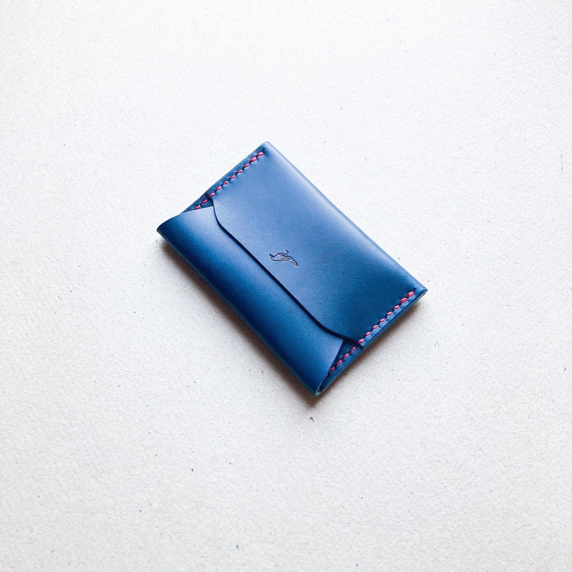 Closed Blue Pattern - Warden Wallet displayed on a white table.